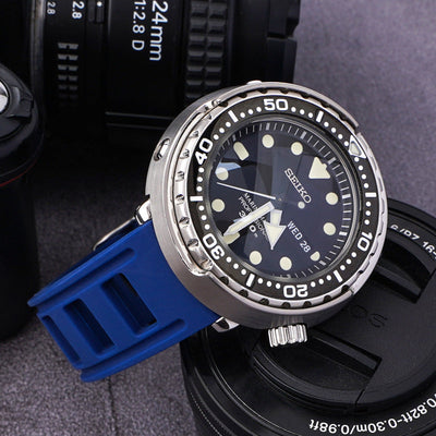 Blue series silicone strap watch accessory on silver Seiko watch with black dial and rotating bezel